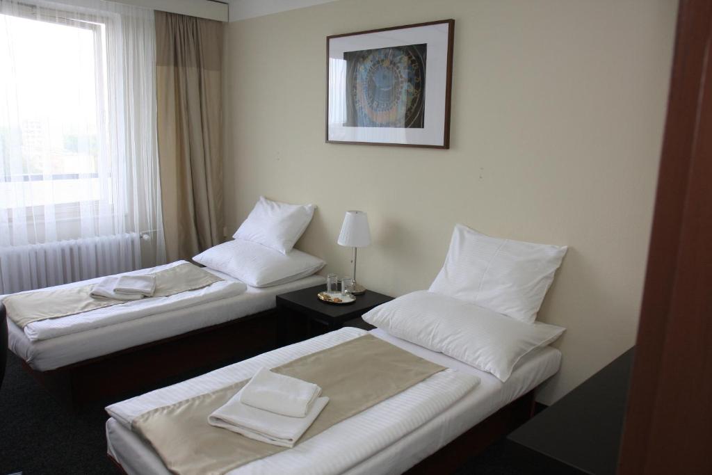 Двухместный (Стандартный двухместный номер с 1 кроватью или 2 отдельными кроватями) отеля Kladno, Кладно