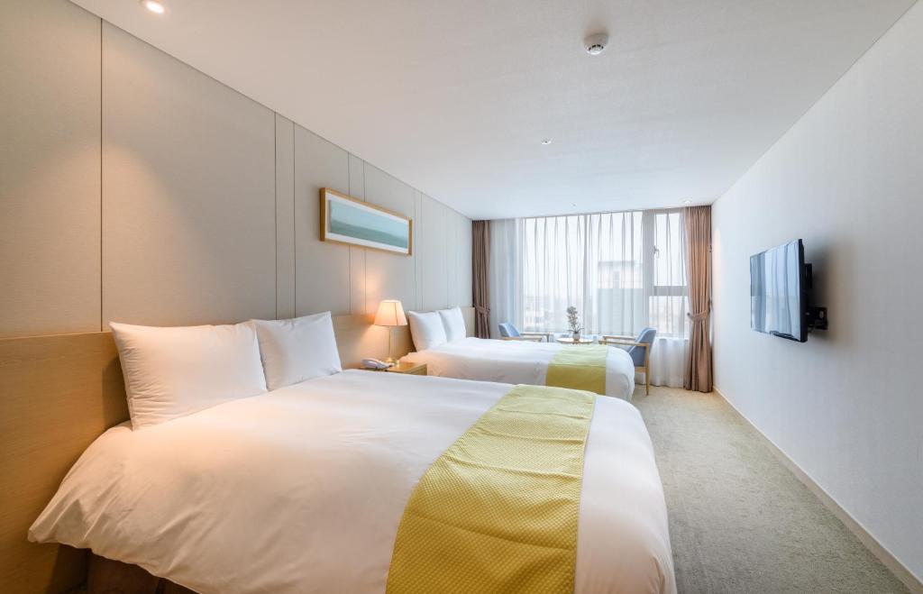 Двухместный (Двухместный номер с 1 кроватью или 2 отдельными кроватями) отеля Win Sky Hotel, Согвипхо