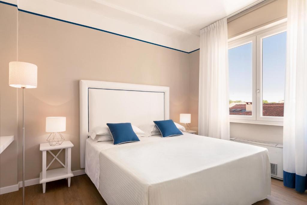 Двухместный (Двухместный номер с 1 кроватью или 2 отдельными кроватями - В дополнительном здании) отеля Hotel Sina Astor, Виареджо