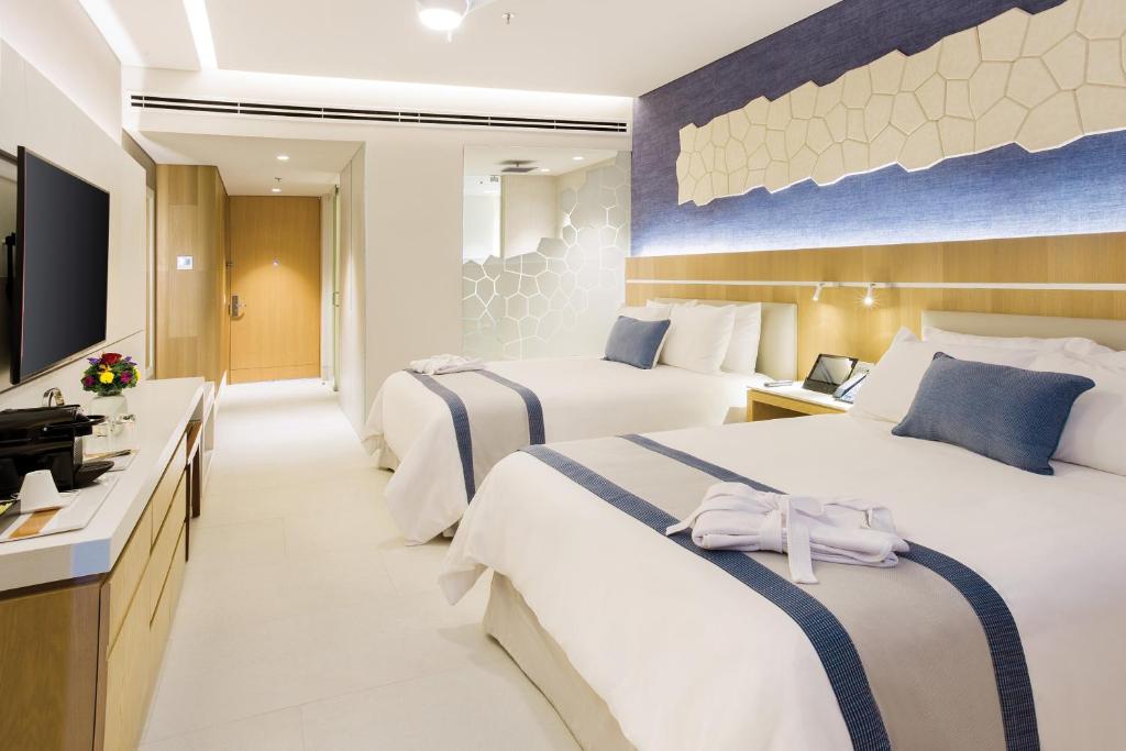 Двухместный (Привилегированный клубный номер с видом на океан и кроватями размера «queen-size») курортного отеля Sunscape Star Cancun, Канкун