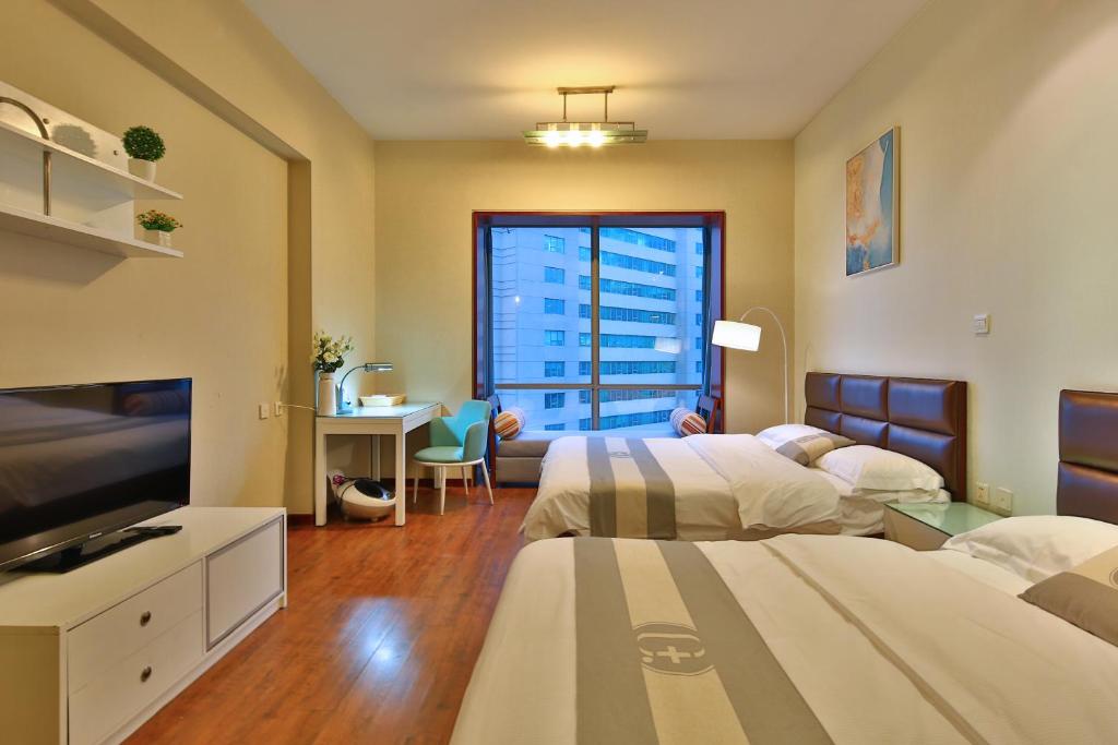 Четырехместный (Семейный номер), Qingdao Jinshan We+ Holiday Apartment (Qingdao Olympic Sailing Center)