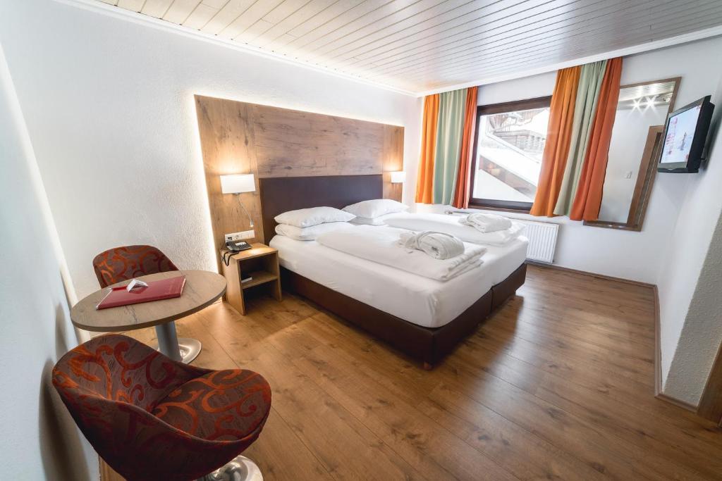Двухместный (Классический двухместный номер с 1 кроватью) отеля Alpen Adria Hotel & Spa, Хермагор-Прессеггер-Зе