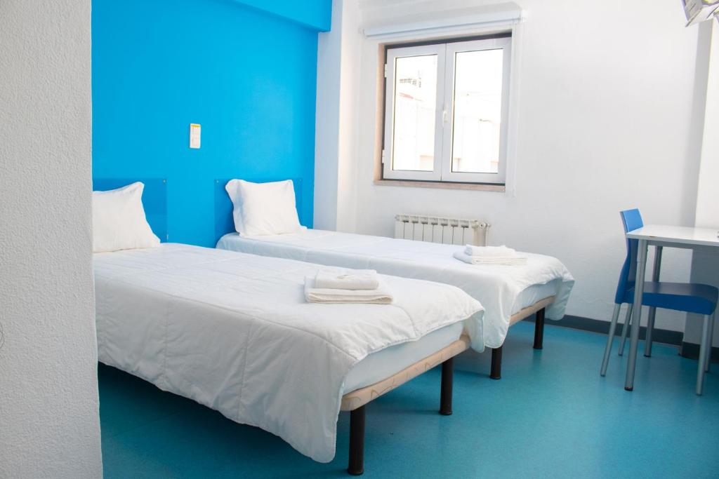 Двухместный (Стандартный двухместный номер с 2 отдельными кроватями) хостела HI Hostel Lisboa - Pousada de Juventude, Лиссабон