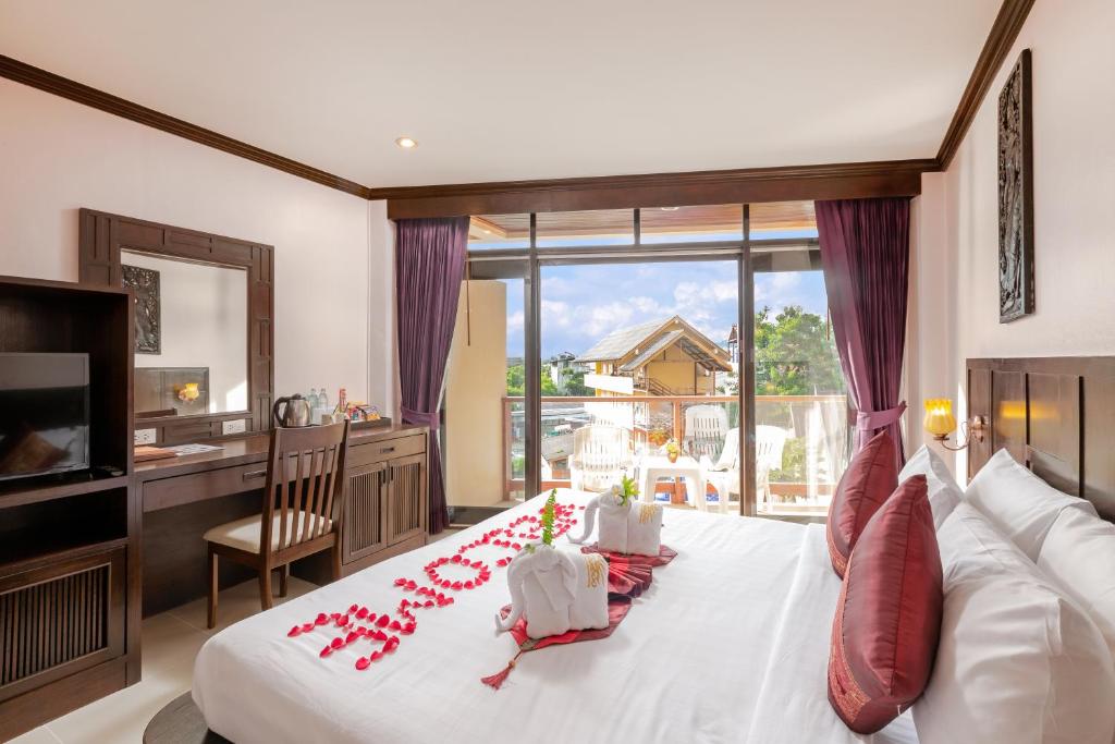 Двухместный (Двухместный номер Делюкс с 1 кроватью) курортного отеля Club Bamboo Boutique Resort & Spa, Пхукет