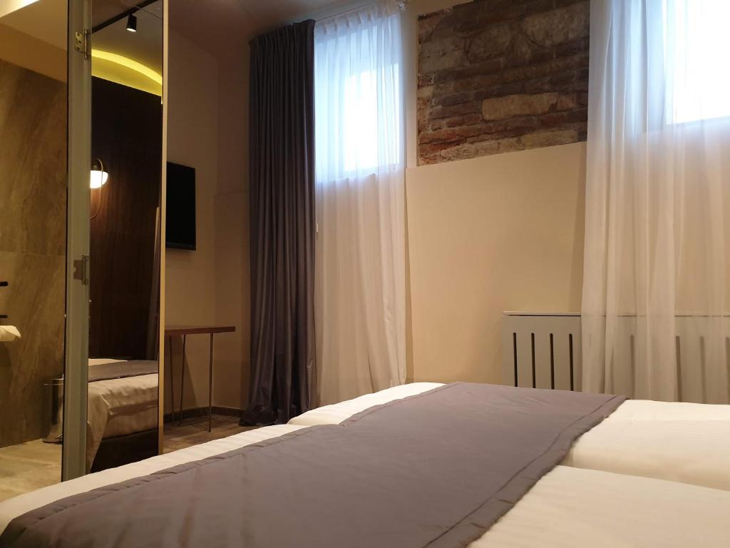 Двухместный (Стандартный двухместный номер с 1 кроватью или 2 отдельными кроватями) отеля Siago Hotel, Клуж-Напока