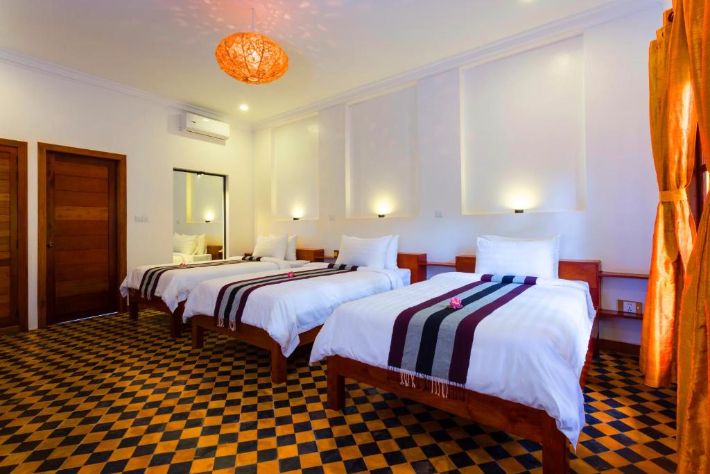 Трехместный (Triple Room - Free Pick Up & City Center Shuttle) отеля Le Jardin d'Angkor Hotel & Resort, Сием Рип