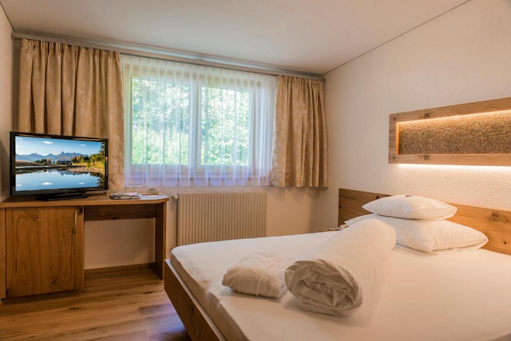 Двухместный (Небольшой двухместный номер с 1 кроватью) отеля Aparthotel Tschanun Garni, Партенен