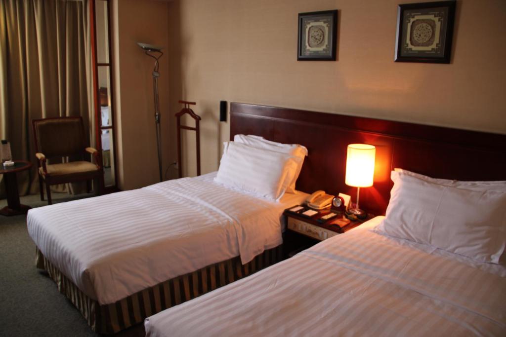 Двухместный (Представительский двухместный номер с 2 отдельными кроватями) отеля Rosedale Hotel & Suites Guangzhou, Гуанчжоу