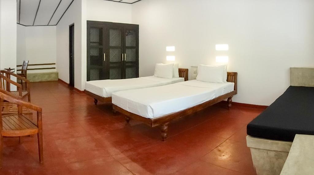 Двухместный (Бюджетный двухместный номер с 1 кроватью или 2 отдельными кроватями) отеля Nilaveli Beach Hotel, Нилавели