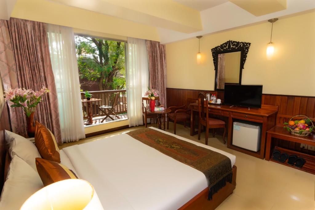 Двухместный (Улучшенный двухместный номер с 1 кроватью) отеля City River Hotel, Сием Рип