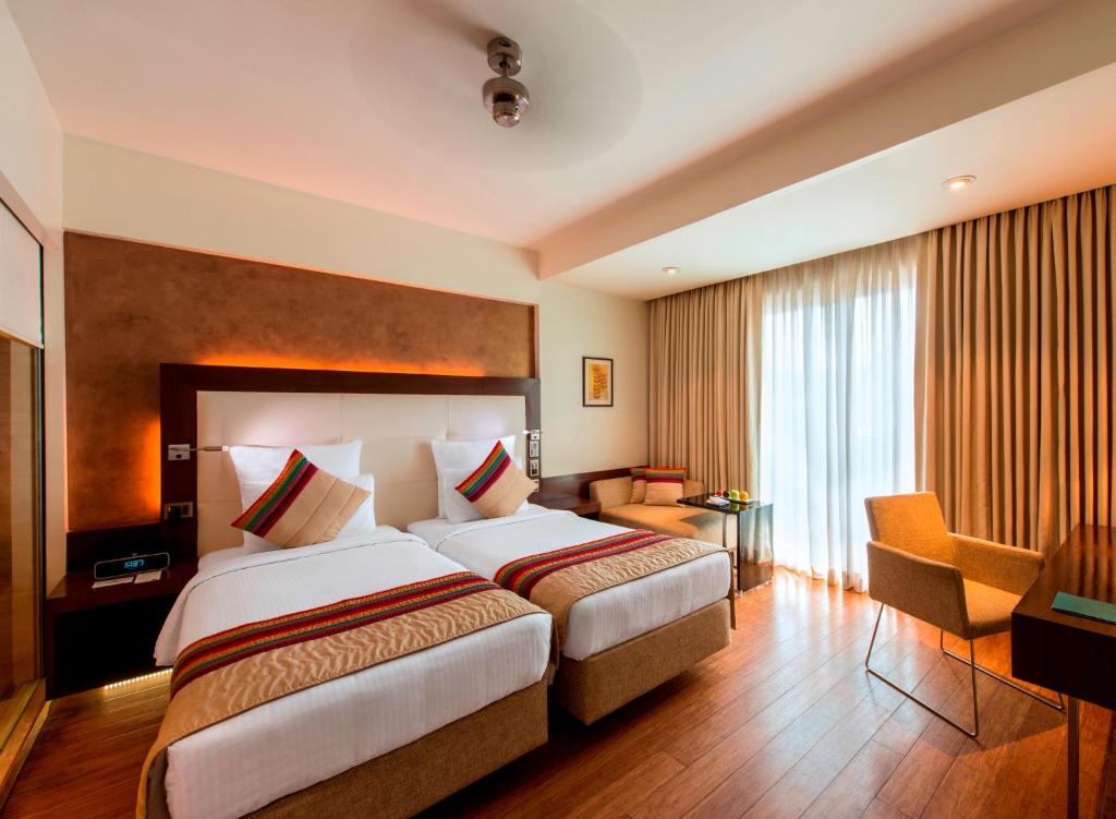 Двухместный (Двухместный номер Делюкс с 2 отдельными кроватями) отеля Novotel Goa Shrem Hotel, Кандолим