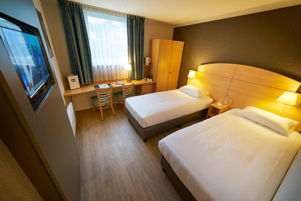 Двухместный (Двухместный номер с 2 отдельными кроватями) отеля Campanile Hotel & Restaurant Brussels Drogenbos, Брюссель