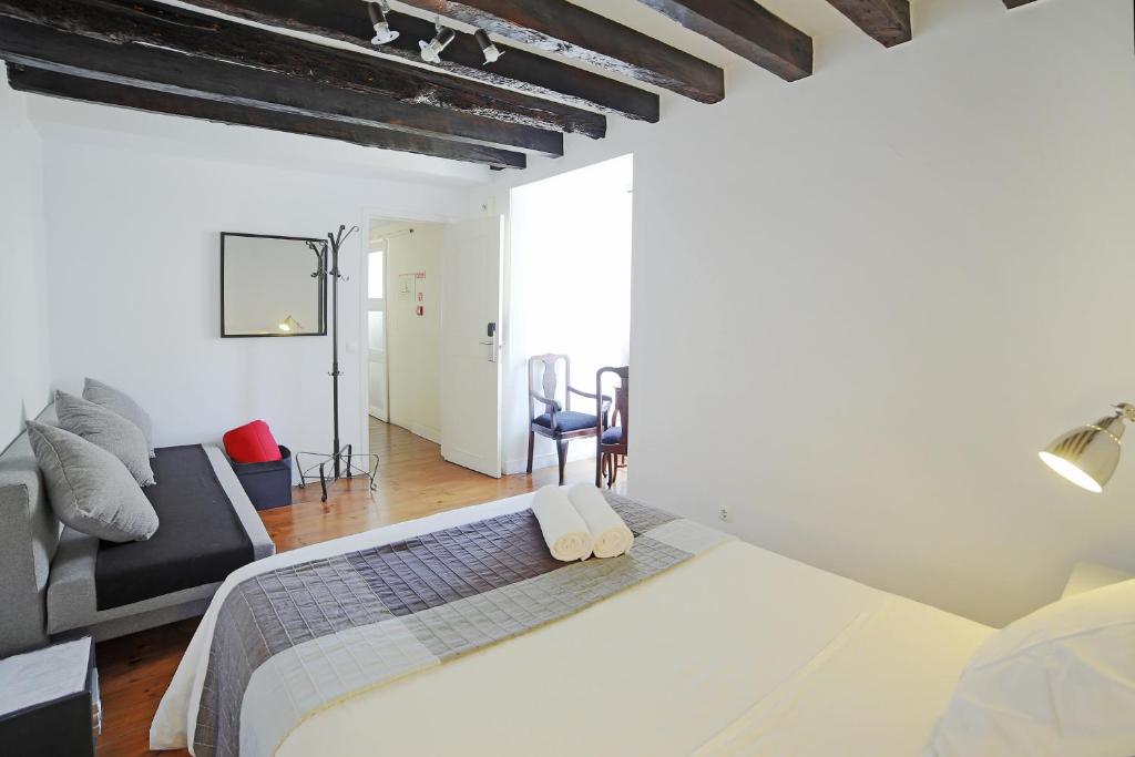 Двухместный (Стандартный двухместный номер с 1 кроватью и общей ванной комнатой) хостела Rossio Hostel, Лиссабон