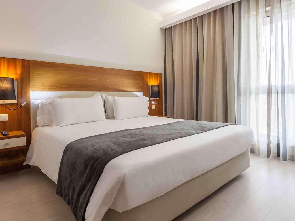 Двухместный (Улучшенный двухместный номер с 1 кроватью) отеля Hotel Mercure Lisboa, Лиссабон