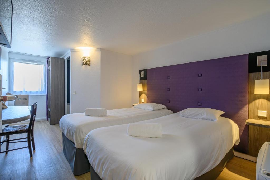Двухместный (Стандартный двухместный номер с 2 отдельными кроватями) отеля Brit Hotel Reims La Neuvilette, Реймс
