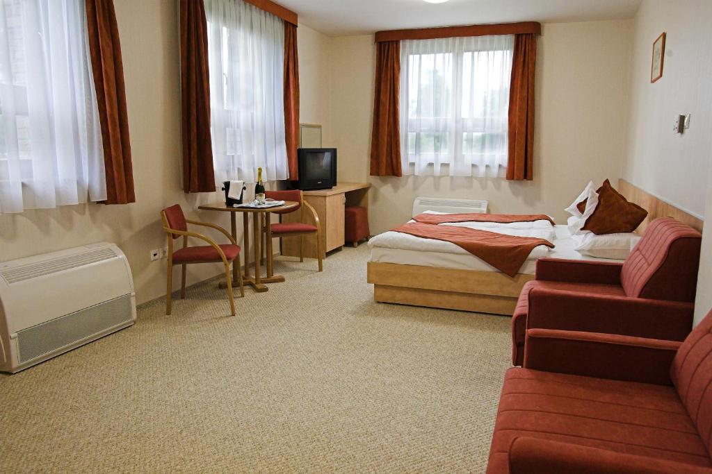 Двухместный (Двухместный номер с 1 кроватью или 2 отдельными кроватями) отеля Völgyikút Ház, Веспрем