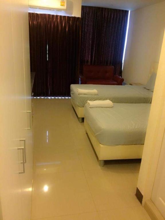Двухместный (Стандартный двухместный номер с 2 отдельными кроватями) апарт-отеля BB Grand Residence, Паттайя