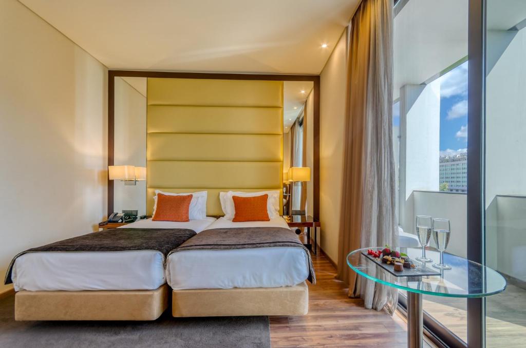 Двухместный (Представительский двухместный номер с 2 отдельными кроватями) отеля TURIM Av. Liberdade Hotel, Лиссабон