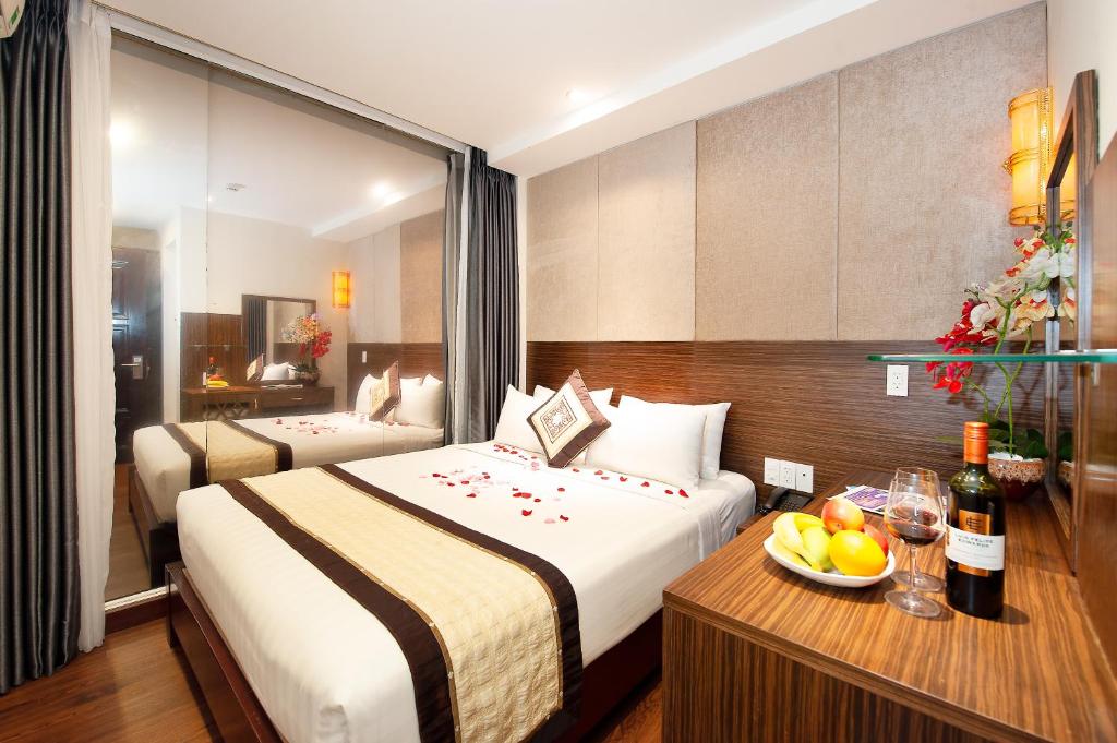 Двухместный (Номер Делюкс с кроватью размера «queen-size») отеля Saigonciti Hotel, Хошимин