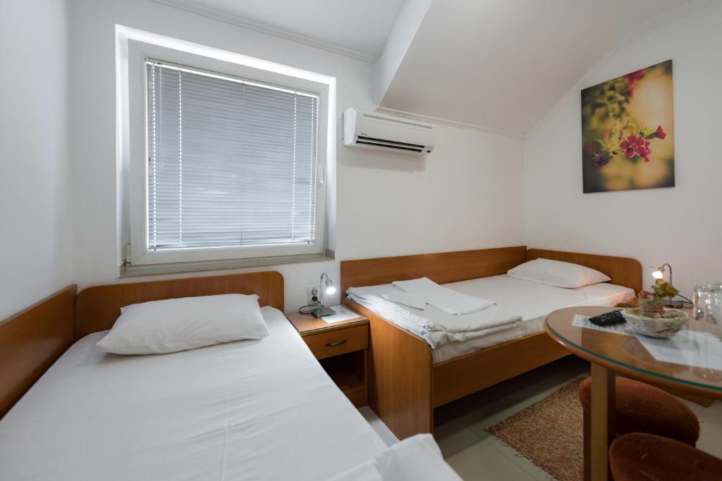 Двухместный (Двухместный номер с 2 отдельными кроватями) отеля Rooms Gat, Суботица