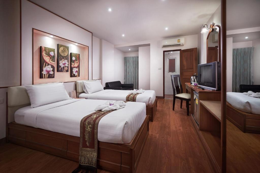 Двухместный (Стандартный двухместный номер с 2 отдельными кроватями) отеля KC Place, Бангкок