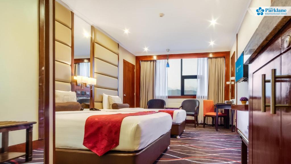 Двухместный (Двухместный номер Parklane с 1 кроватью или 2 отдельными кроватями) отеля Cebu Parklane International Hotel, Себу