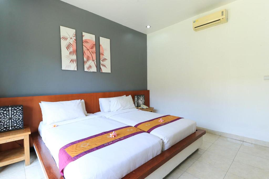 Двухместный (Двухместный номер «Премиум» с 2 отдельными кроватями) парк-отеля Bali Merita Villas, Чангу