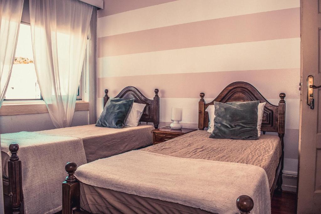 Двухместный (Двухместный номер с 2 отдельными кроватями и ванной комнатой) гостевого дома Guest House Infante Dom Henrique, Коимбра