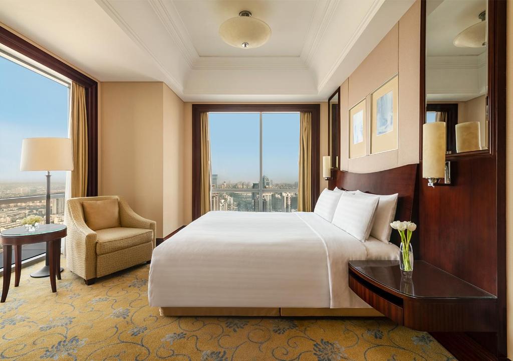 Двухместный (Executive Suite King（Enjoy minibar for free during the first night,until Dec 31st of 2021 ）) отеля Shangri-La Hotel,Suzhou, Сучжоу