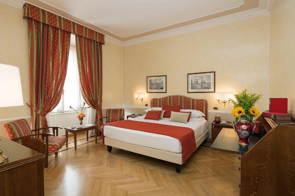 Двухместный (Улучшенный двухместный номер с 1 кроватью или 2 отдельными кроватями) отеля Bettoja Hotel Massimo d'Azeglio, Рим