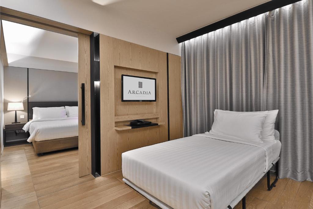 Трехместный (Номер Делюкс - Для 3 гостей) отеля Arcadia Suites Ploenchit Sukhumvit by Compass Hospitality, Бангкок