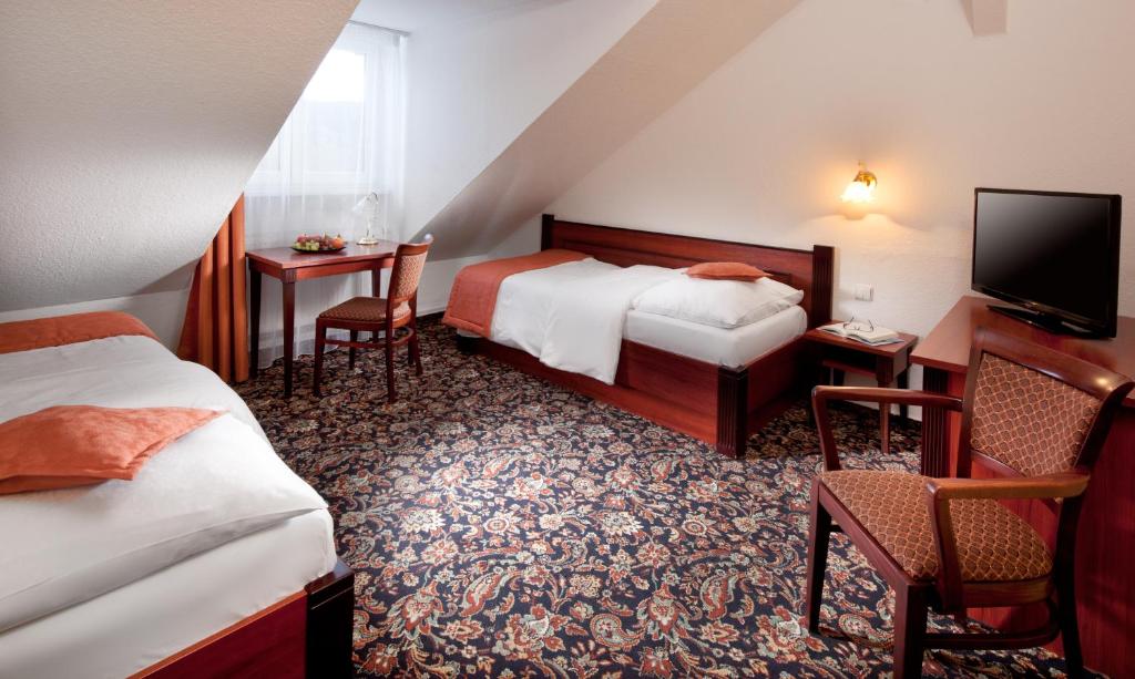 Двухместный (Стандартный двухместный номер с 2 отдельными кроватями) отеля Chateau Monty Spa Resort, Марианские Лазне