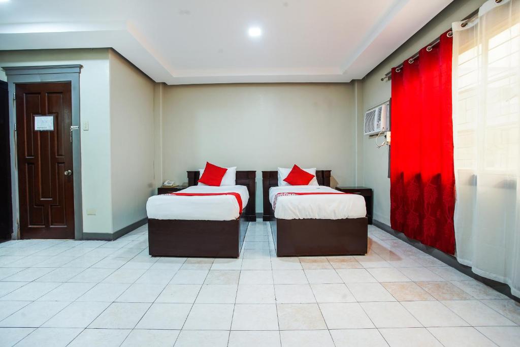 Двухместный (Двухместный номер Делюкс с 2 отдельными кроватями) отеля OYO 192 TCC Condo-Hostel, Давао