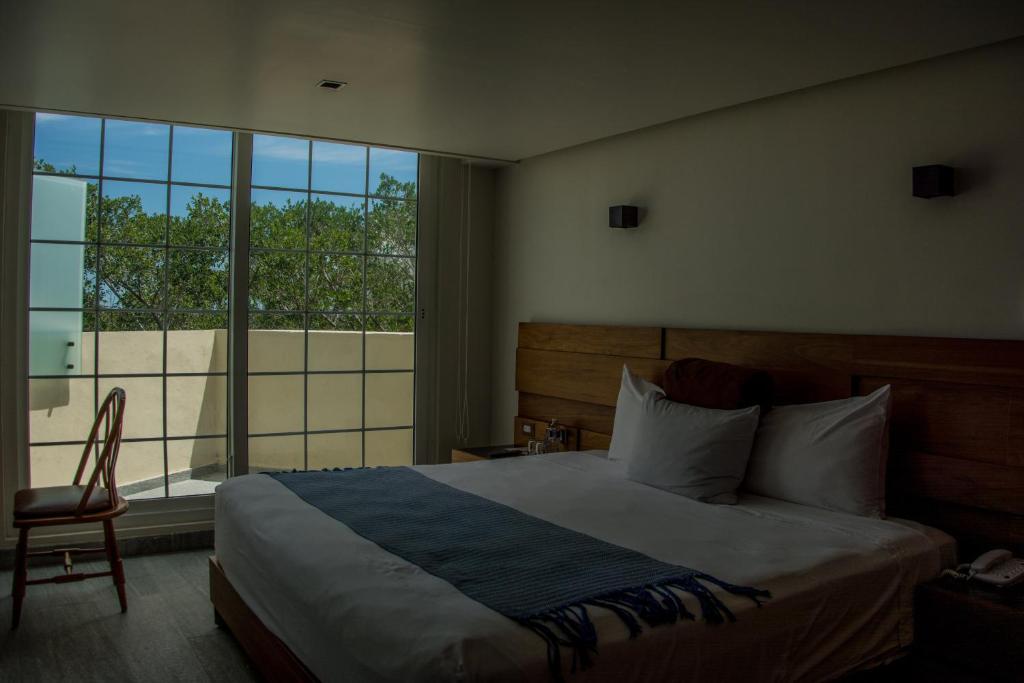 Двухместный (Стандартный двухместный номер с 1 кроватью) отеля Hotel Plaza Kokai Cancún, Канкун