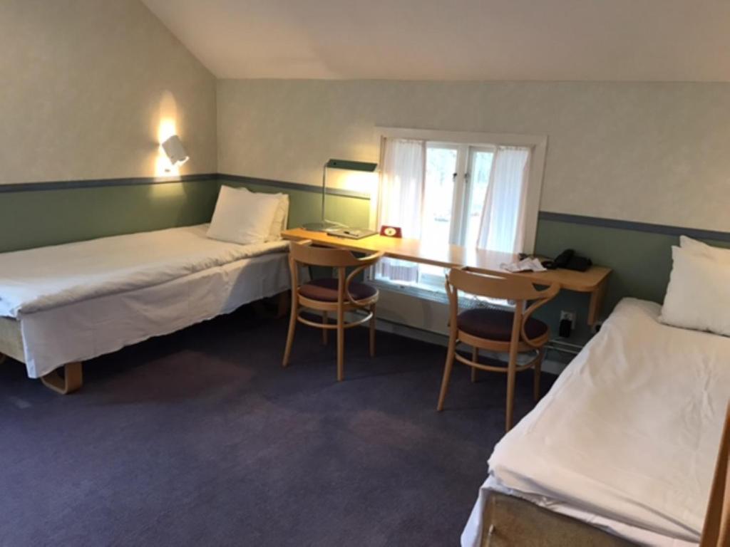Двухместный (Бюджетный двухместный номер с 2 отдельными кроватями) отеля Karstorp Säteri – Hotell och Konferens, Шёвде