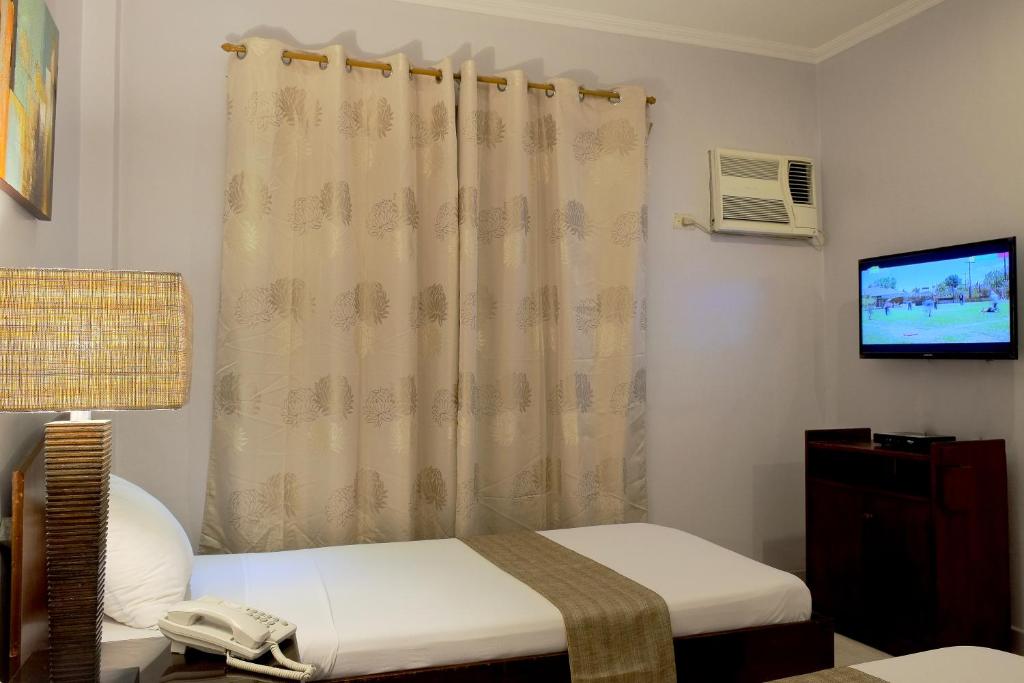 Двухместный (Стандартный двухместный номер с 2 отдельными кроватями) отеля Palazzo Pensionne, Себу