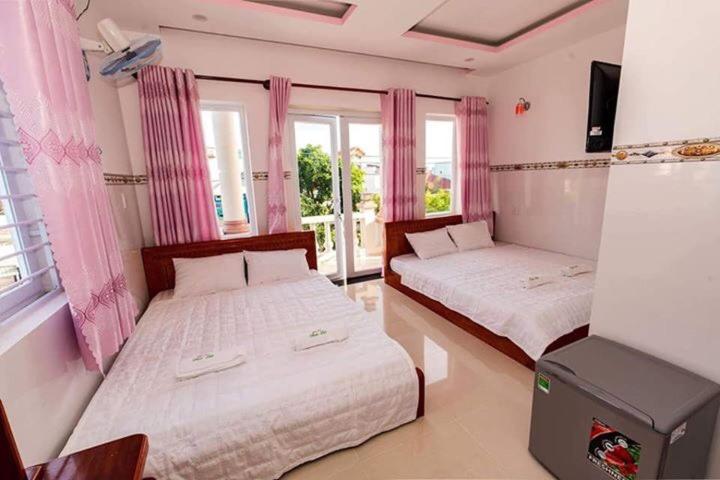Четырехместный (Четырехместный номер с видом на море) отеля Hotel Thảo Lợi, Кондао