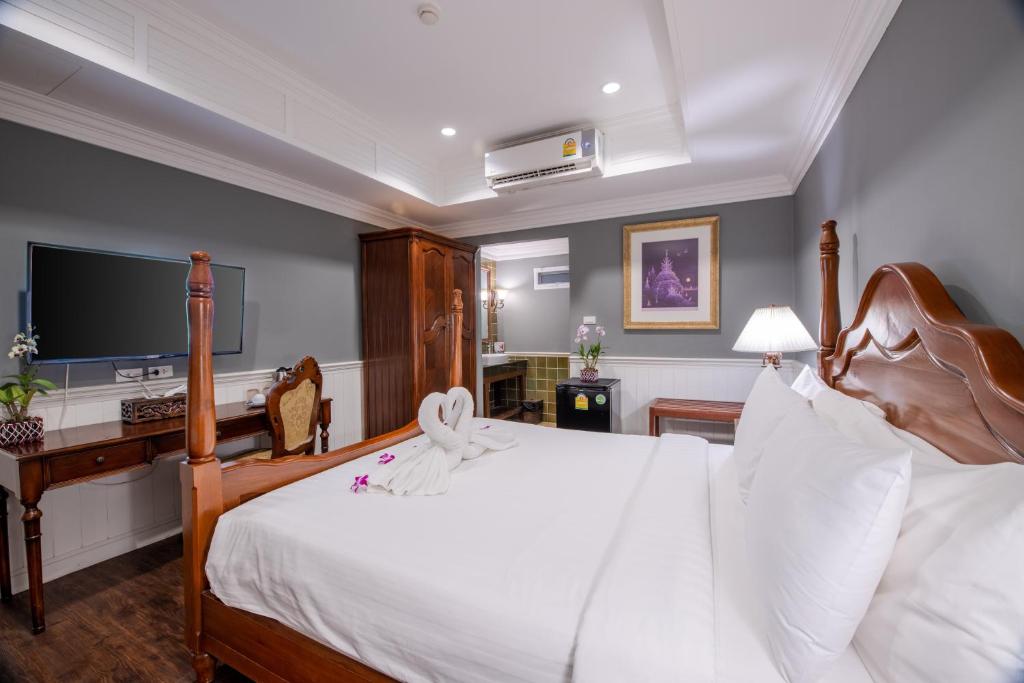 Двухместный (Двухместный номер Делюкс с 1 кроватью или 2 отдельными кроватями (без окон)) курортного отеля The Orchid House 153, Бангкок