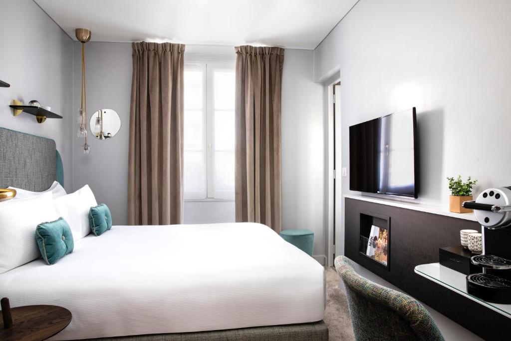 Двухместный (Улучшенный двухместный номер с 1 кроватью или 2 отдельными кроватями) отеля Eiffel Saint Charles, Париж