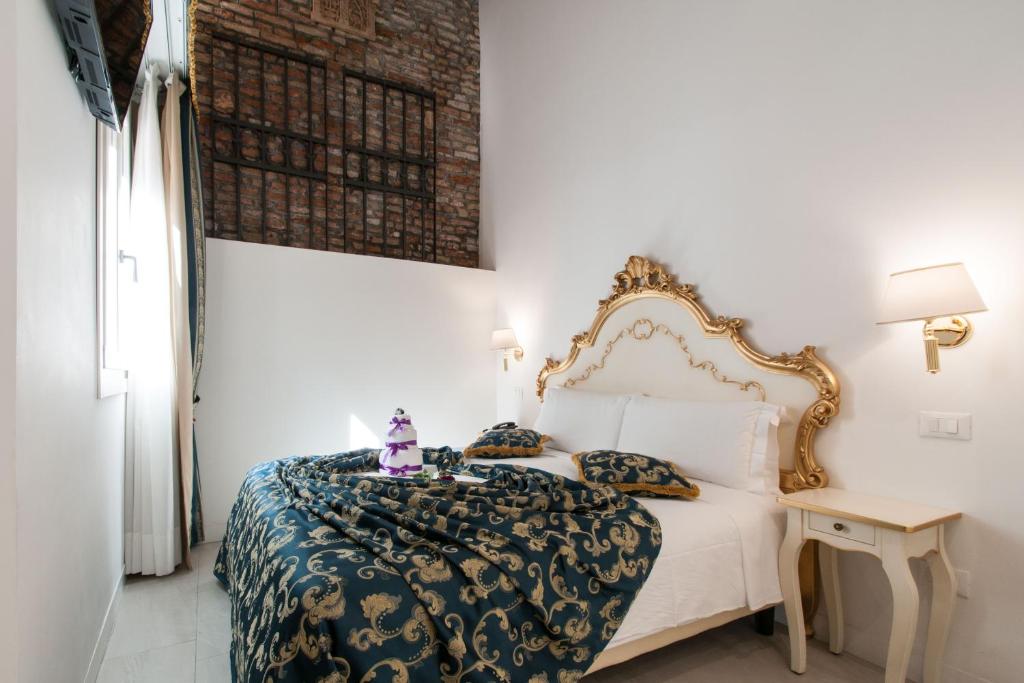 Двухместный (Стандартный двухместный номер с 1 кроватью или 2 отдельными кроватями) отеля Al Mascaron Ridente, Венеция