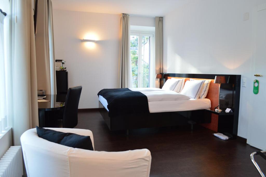 Двухместный (Двухместный номер Делюкс с 1 кроватью) отеля Boutique Hotel La Rinascente, Локарно