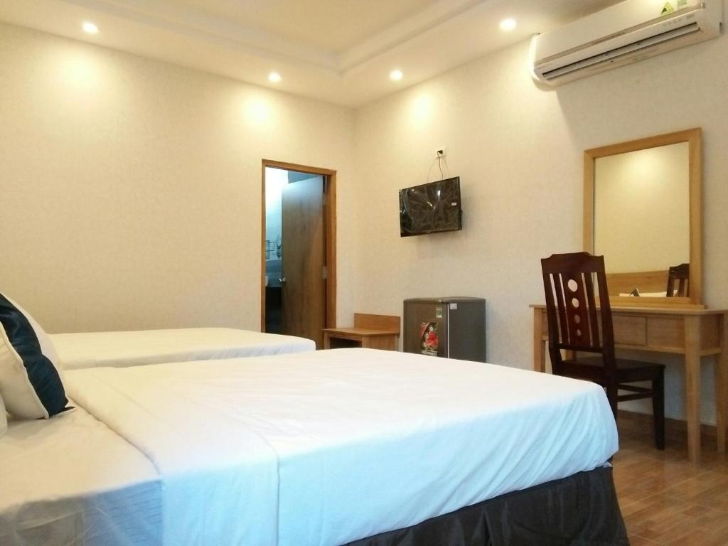 Двухместный (Двухместный номер Делюкс с 2 отдельными кроватями) отеля Thanh Truc Hotel Ca Mau, Камау