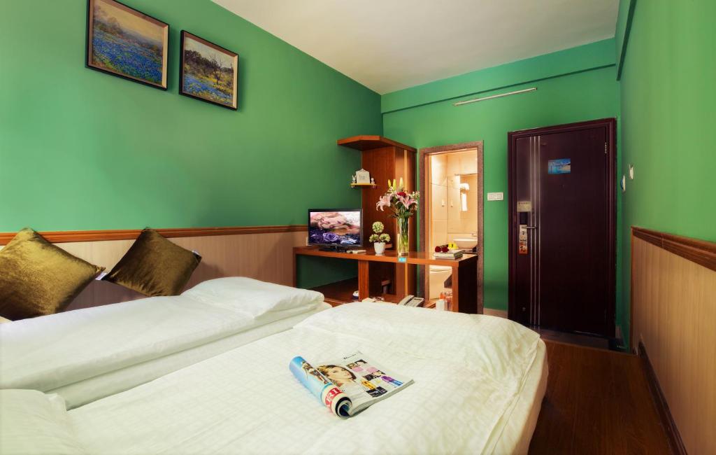 Двухместный (Бюджетный двухместный номер с 2 отдельными кроватями) апартамента Sanya Tropical Coast Hotel, Санья