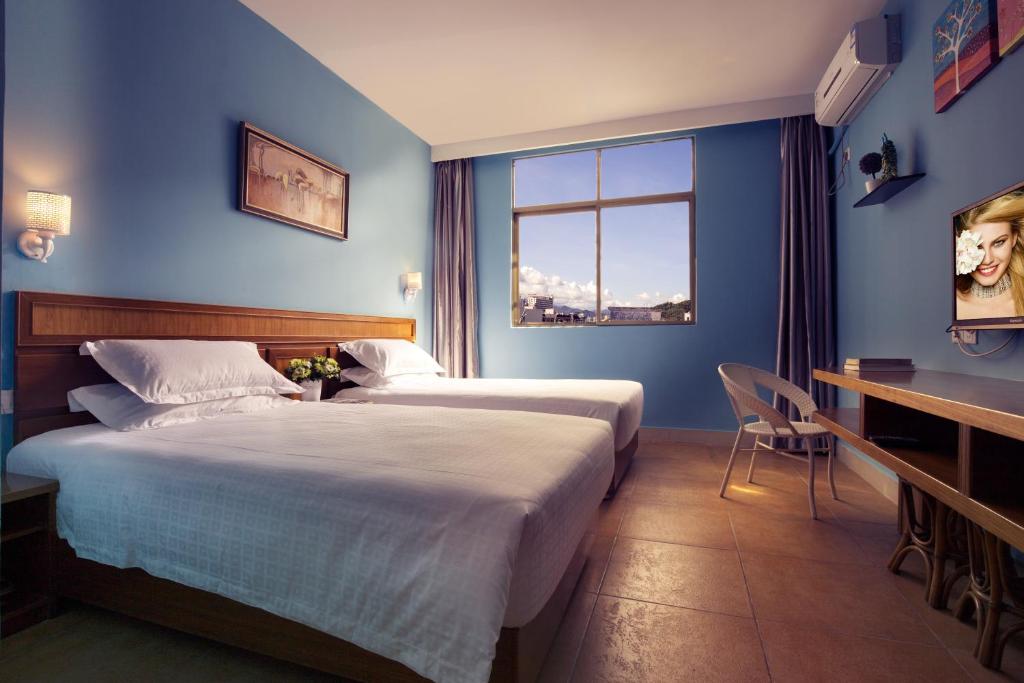 Двухместный (Стандартный двухместный номер с 2 отдельными кроватями) апартамента Sanya Tropical Coast Hotel, Санья