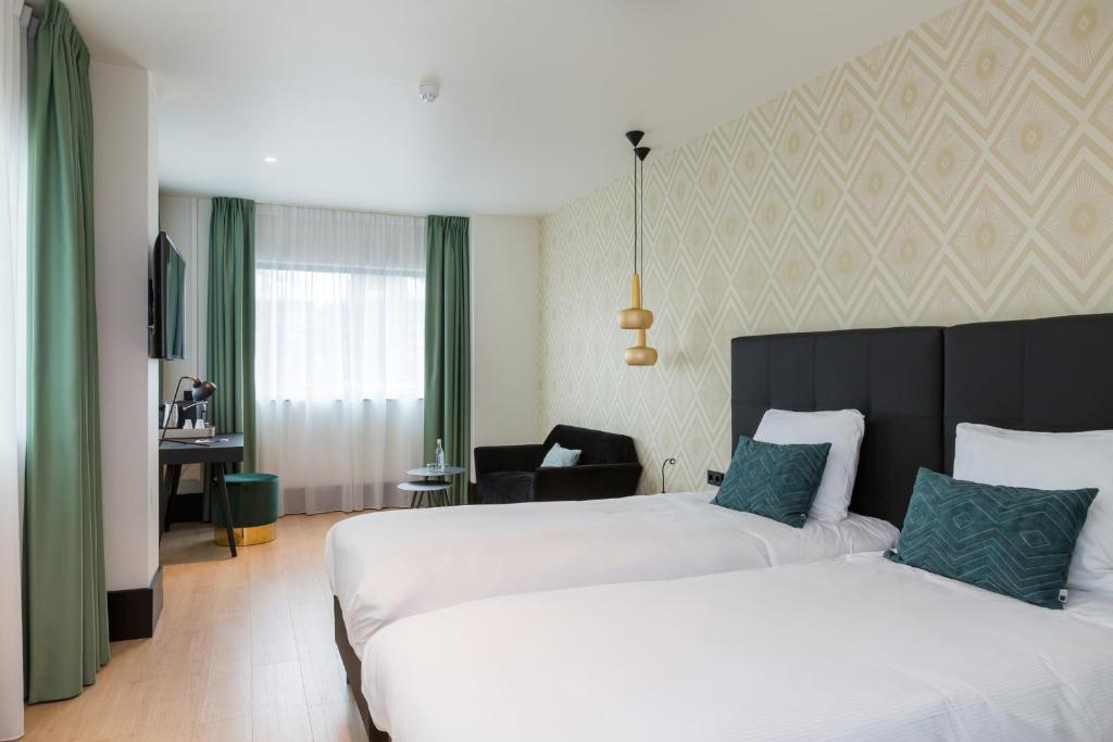 Двухместный (Двухместный номер «Комфорт Плюс» с 2 отдельными кроватями) отеля The James Rotterdam, Роттердам