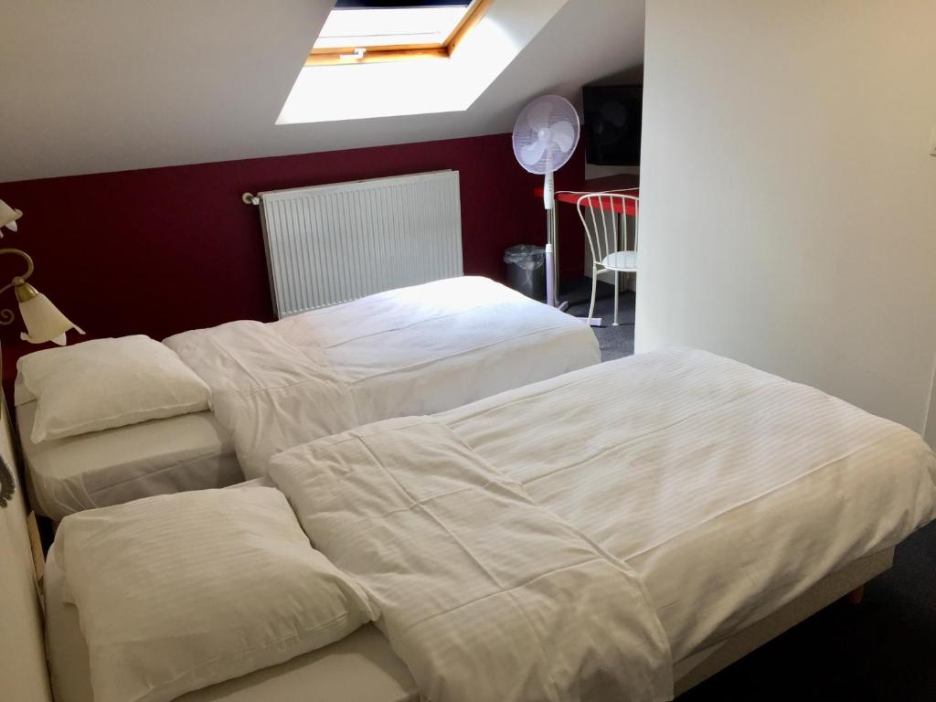 Двухместный (Двухместный номер с 1 кроватью или 2 отдельными кроватями - Мансарда) отеля Hotel Rubenshof, Антверпен