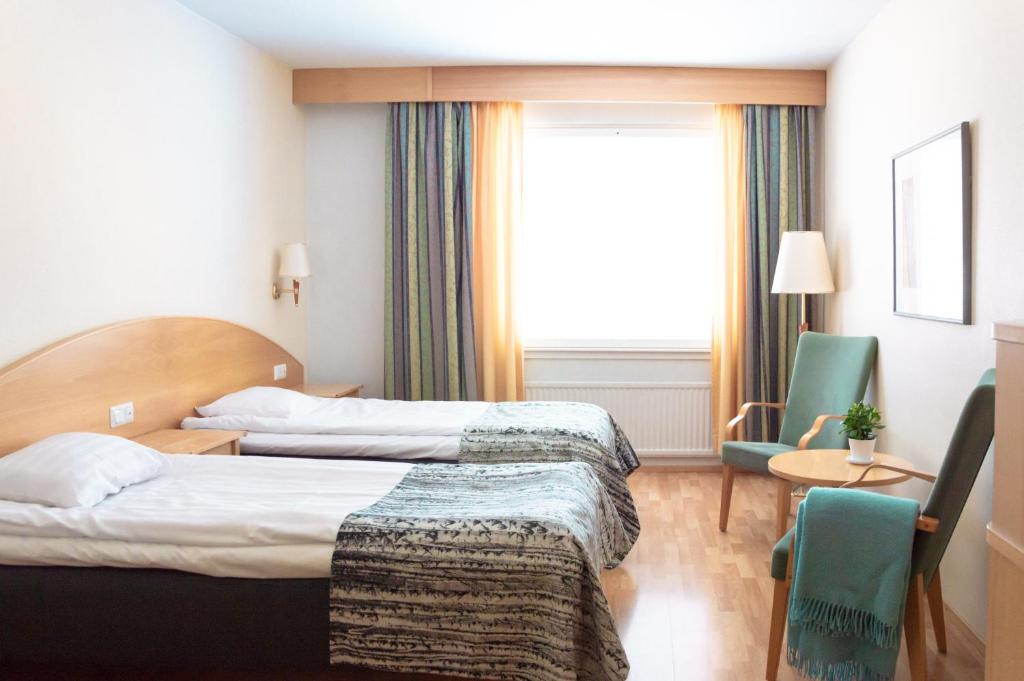 Двухместный (Двухместный номер с 2 отдельными кроватями и доступом в спа-центр) отеля Spa Hotel Kunnonpaikka, Куопио