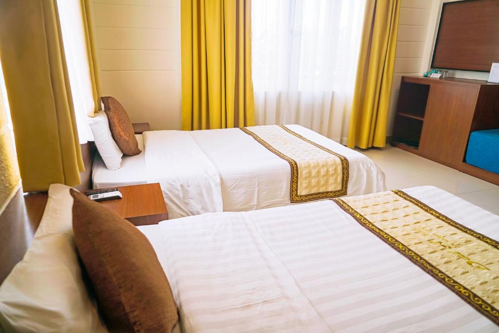 Двухместный (Двухместный номер Делюкс с 2 отдельными кроватями) отеля Dai A Hotel, Дананг