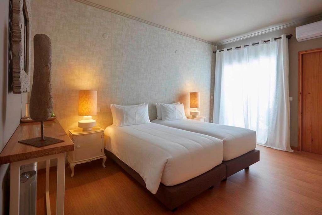 Двухместный (Двухместный номер с 1 кроватью или 2 отдельными кроватями - В главном здании) отеля Quinta da Abelheira, Понта-Делгада