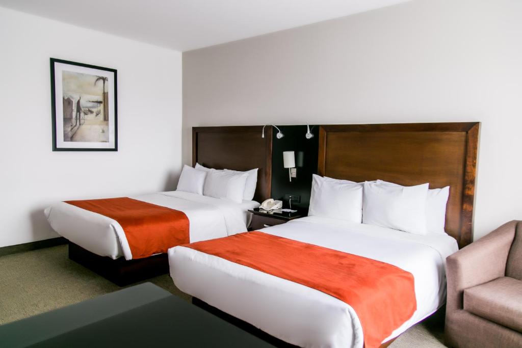 Двухместный (Двухместный номер с 2 двуспальными кроватями) отеля Radisson Poliforum Plaza Hotel Leon, Леон (Штат Гуанахуато)